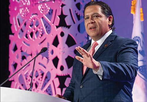 santos vargas speaking at annual meeting